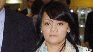 Isabel, ou Ho Hsiao-feng, desembarca em Taiwan para reencontro com a família (Foto: AFP/ Getty)