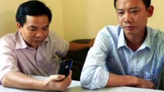 Hai nhà báo Nguyễn Ngọc Năm và Hán Phi Long