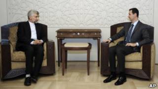Saeed Jalili e Bashar al-Assad em encontro em Damasco (Foto: AP)