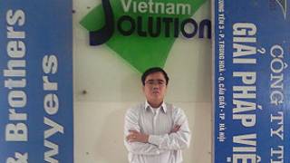 Ông Lê Quốc Quân tại văn phòng của ông trước khi bị bắt