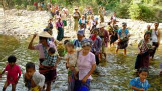Refugees fleeing frm Burma to Thailand