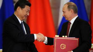 Ông Tập Cận Bình (trái) và ông Vladimir Putin ở Moscow hồi tháng Ba năm 2013