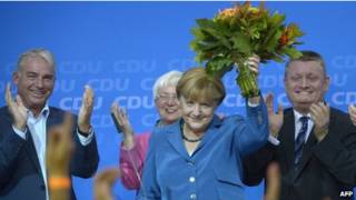 Bà Merkel ăn mừng chiến thắng