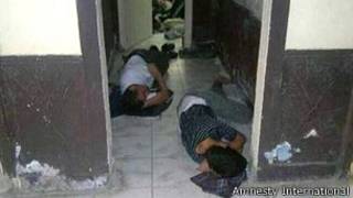 Syrian refugees in a police station in Egypt