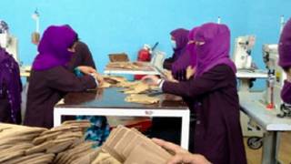 afghani women in a flip-flop factory
