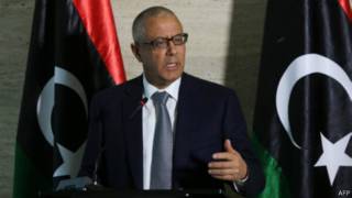 رئيس الوزراء الليبي السابق علي زيدان يتحدث في مؤتمر صحفي في طرابلس في 8 مارس 2014