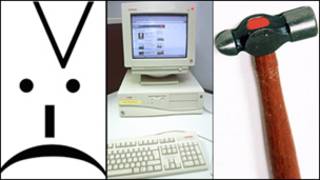 An angry face, a computer and a hammer