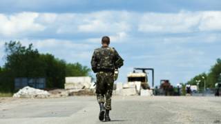 Вооруженный человек на Украине