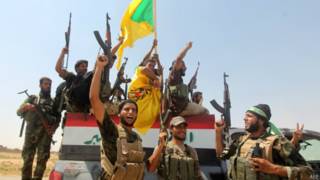 Milícia xiita iraniana comemora derrota do IS em Amerli, dia 3 de setembro de 2014 | Foto: AFP