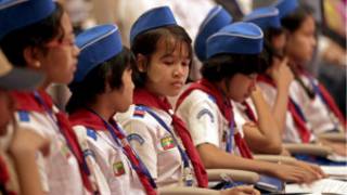 Girls scout member attend the ceremony of the International Day of Democracy at the parliament building in Naypyitaw