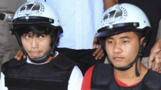 Two Burmese workers are accused of murdering two British tourists in Thailand.