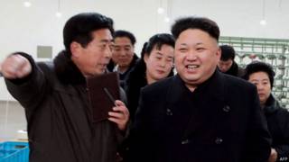 This undated picture released from North Korea"s official Korean Central News Agency (KCNA) on December 21, 2014 shows North Korean leader Kim Jong-Un visiting the Kim Jong-Suk Pyongyang Textile Mill in Pyongyang