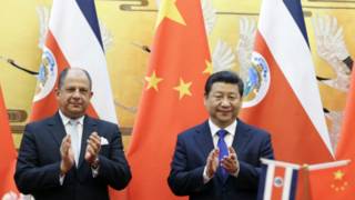 哥斯达黎加总统索利斯(左)与中国国家主席习近平