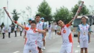 第12届全运会火炬传递(新华社图片)