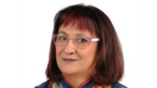 Профессор Сахика Юксел
