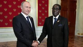 Владимир Путин и Роберт Мугабе