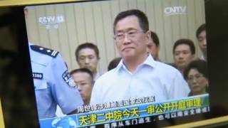 Ảnh từ video của AP, ông Chu Thế Phong tại phiên xử ở Thiên Tân hôm 4/8/2016.