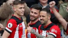 Southampton players celebrate Shane Long's goal against Aston Villa