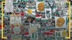 Ferencvaros fans display banners supporting their club
