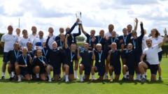 Chelsea squad with the Women's Super League trophy