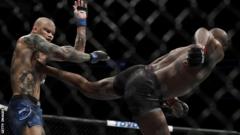 Jones lands a kick on Smith