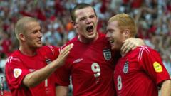 Wayne Rooney celebrates with David Beckham and Paul Scholes at Euro 2004