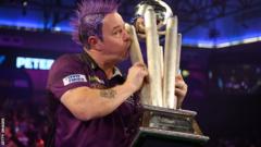 Peter Wright with the PDC World Championship trophy