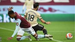 Manchester United got a penalty when Bruno Fernandes span into Ezri Konsa