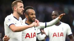 Harry Kane and Lucas Moura celebrate