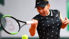 Simona Halep hits a forehand