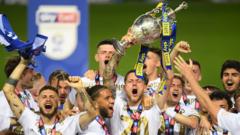 Leeds players with the Championship trophy