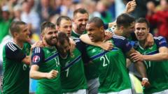 Northern Ireland players celebrate scoring at Euro 2016