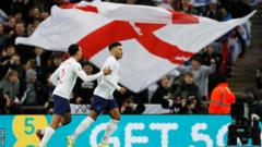 Trent Alexander-Arnold and Alex Oxlade-Chamberlain celebrate the latter's goal against Montenegro