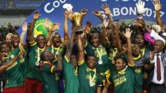 Cameroon's players celebrate winning the Africa Cup of Nations