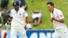 New Zealand's Trent Boult celebrates the wicket of India's Shikhar Dhawan