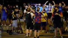 Barcelona fans outside the Nou Camp after Lionel Messi handed in a transfer request