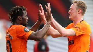 Allan Saint-Maximin and Sean Longstaff celebrate for Newcastle