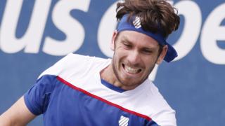 Cameron Norrie hits a return against Diego Schwartzman at the US Open