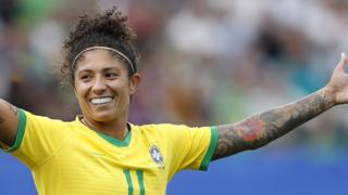 Cristiane celebrates a goal for Brazil