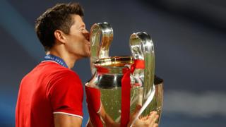 Bayern Munich's Robert Lewandowski with the Champions League trophy