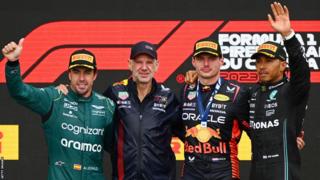Fernando Alonso, Adrian Newey, the Chief Technical Officer of Red Bull Racing, Max Verstappen and Lewis Hamilton on podium