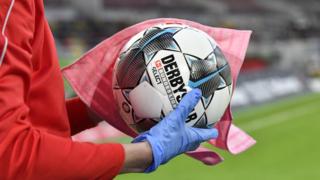 ball being disinfected