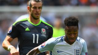 Wales' Gareth Bale and England's Raheem Sterling in action during Euro 2016