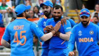 India celebrate a wicket