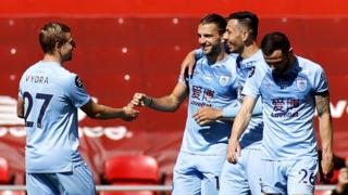 Jay Rodriguez (centre) celebrates scoring against Liverpool
