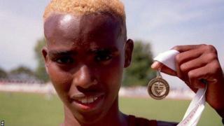 Mo Farah with a medal as a youngster