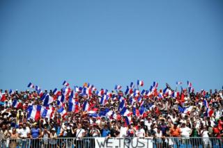 Fans at Paul Ricard wave the French flag