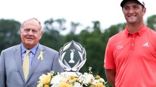 Jack Nicklaus presents Jon Rahm with the Memorial Tournament trophy
