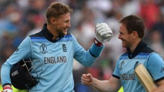 Joe Root and Eoin Morgan celebrate England's victory