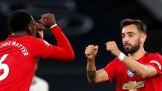 Bruno Fernandes celebrates after scoring a penalty against Tottenham